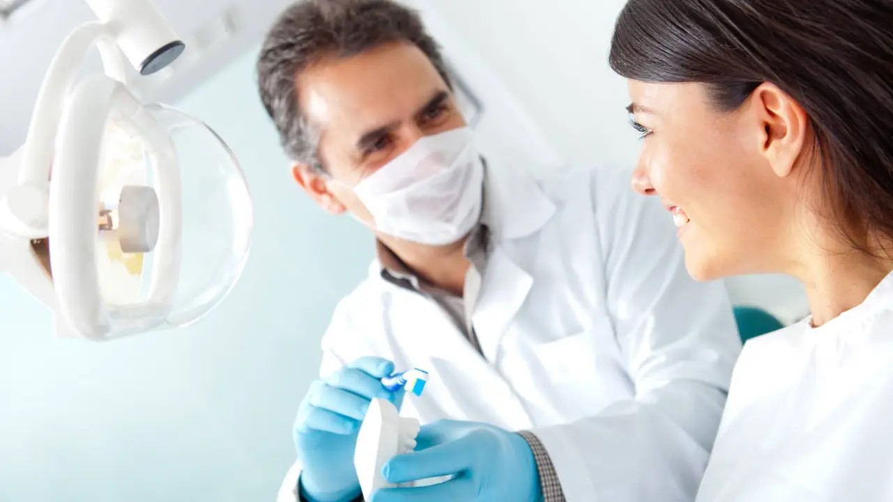 a dentist treats a patient