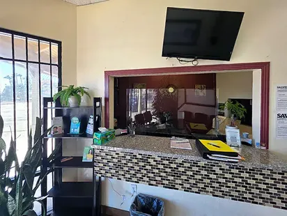 San Bernardino dental practice with 4 operatories in busy retail hub