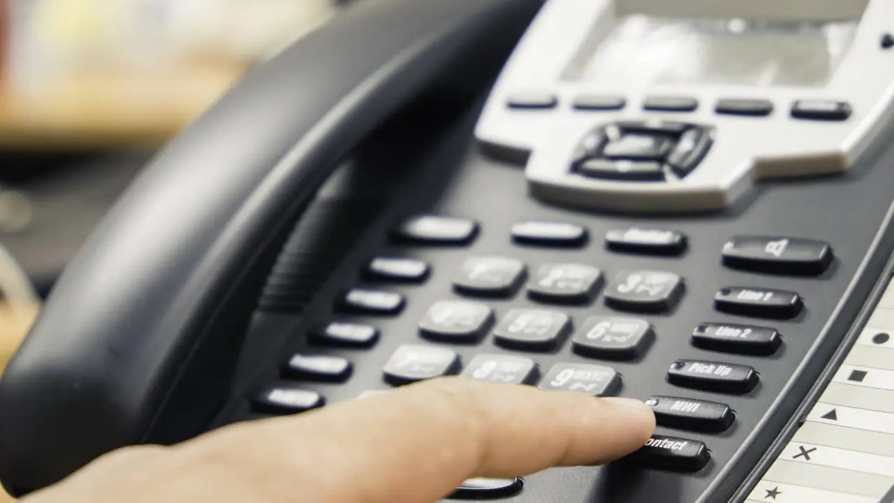 a person dials a phone number