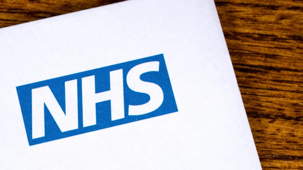 a close-up of the National Health Service logo on a letterhead