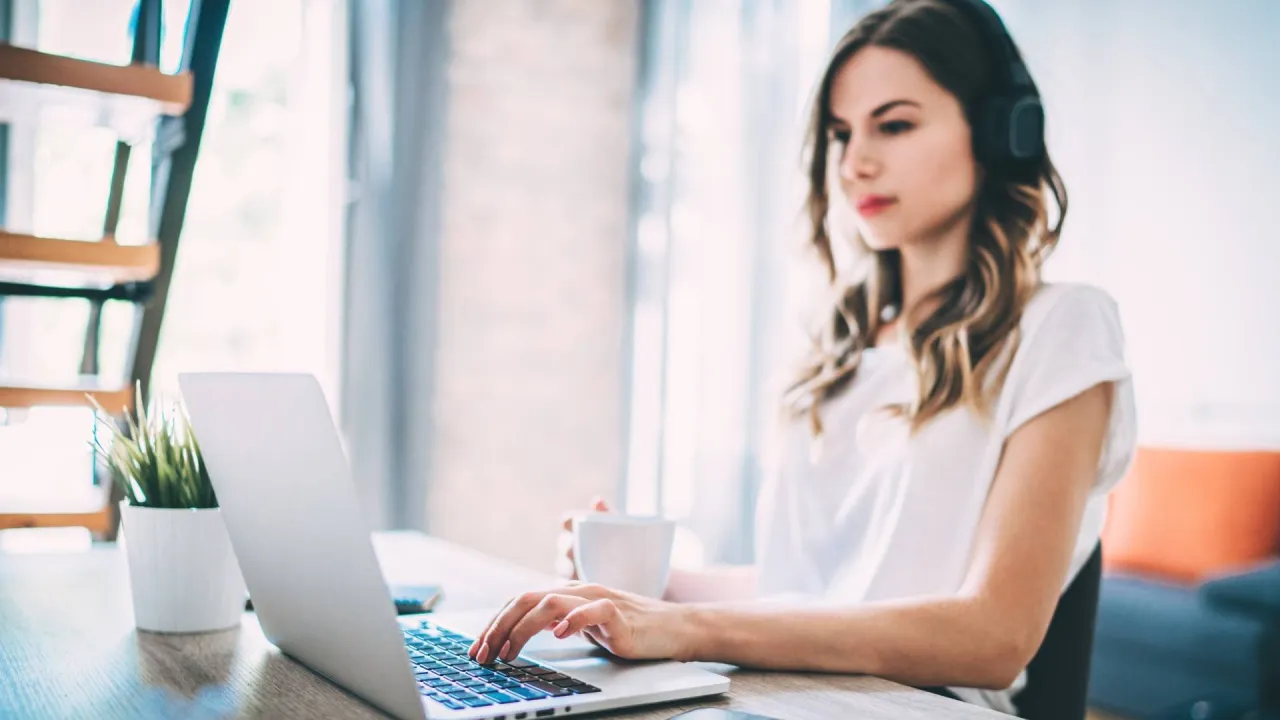 a dentist decides to review dental practice listings online on their laptop